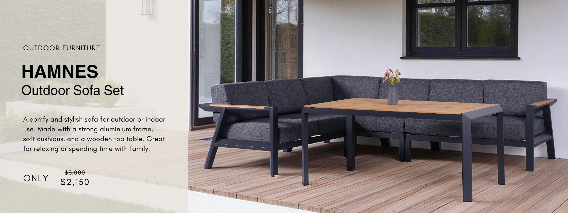 HAMNES outdoor sofa set with dark gray cushions and aluminum frame, includes wooden-top table on a patio deck.