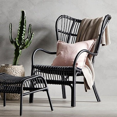 black rattan armchair