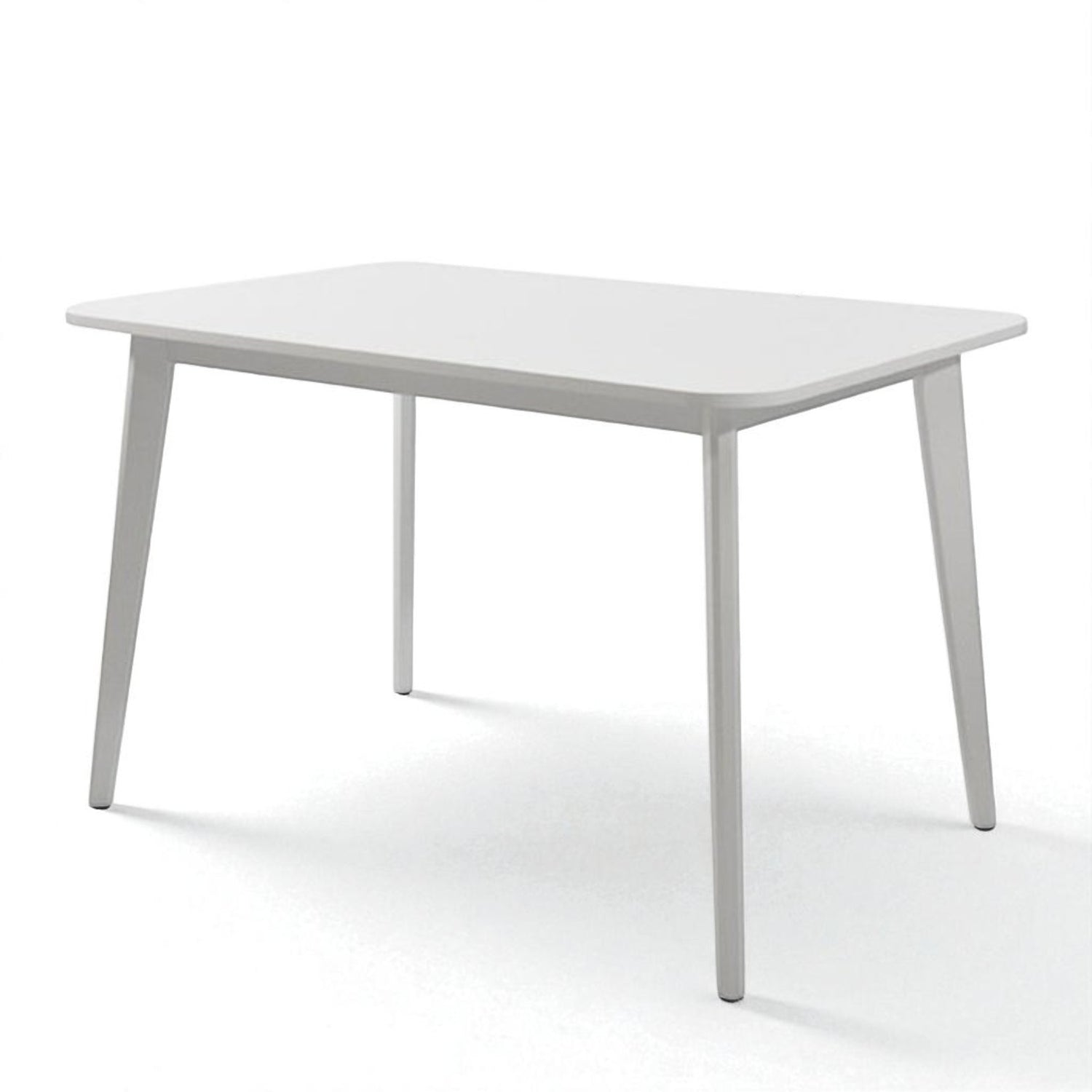 Contemporary wooden dining set with a rectangular table and four cushioned chairs. Features tapered legs, rounded edges, and dark fabric seats. Styled with a blue vase, greenery, glassware, and white plates on a plain white background.