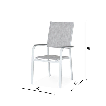 Pisa Outdoor Dining Chair with white aluminum frame and grey sling fabric seat and backrest, placed on a wooden patio beside a potted plant and modern building wall.