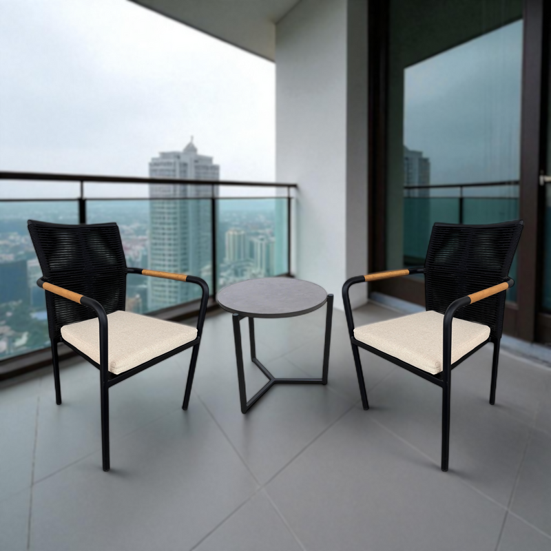 SKANÖR balcony set with black chairs, beige cushions, wooden armrests, and round table overlooking city skyline