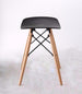 Saddle stool with wooden legs, black
